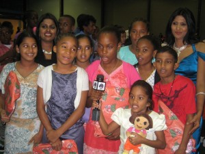 GFLF members and Children -with Gifts caht with the media