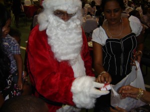 DSC00924 GFLF member helps Santa with the Jewellery gifts
