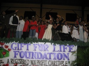 IMG_2592 GFLF members join the children on stage to sing -We are the world , We are the Children