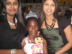 IMG_2636 GFLF members takes a shot with this beautiful princess from Jesus Cares Cottage- gifts are courtesy Calvin and Shameel Adams