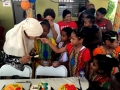 Children-are-feeding-the-mothers-during-cake-cutting-session