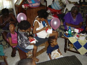 Children engrossed with their KFC and balloons