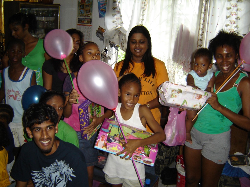 Children all happy to get early christmas gifts