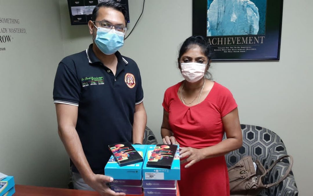 Dr. Derek Ramcharitar donates 10 Tablets to the needy